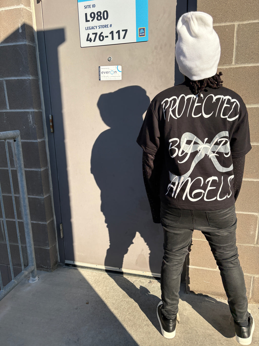 GOD CHILD” thermal Rinestone sleeve tees